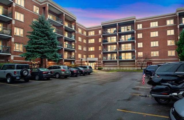 a view of a parked cars in front of a building