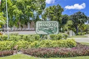 a sign on the side of the road