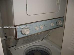 4166 Inverrary Drive, Unit 405 Lauderhill, FL 33319 - Photo 11 of 11 a utility room with dryer and washer