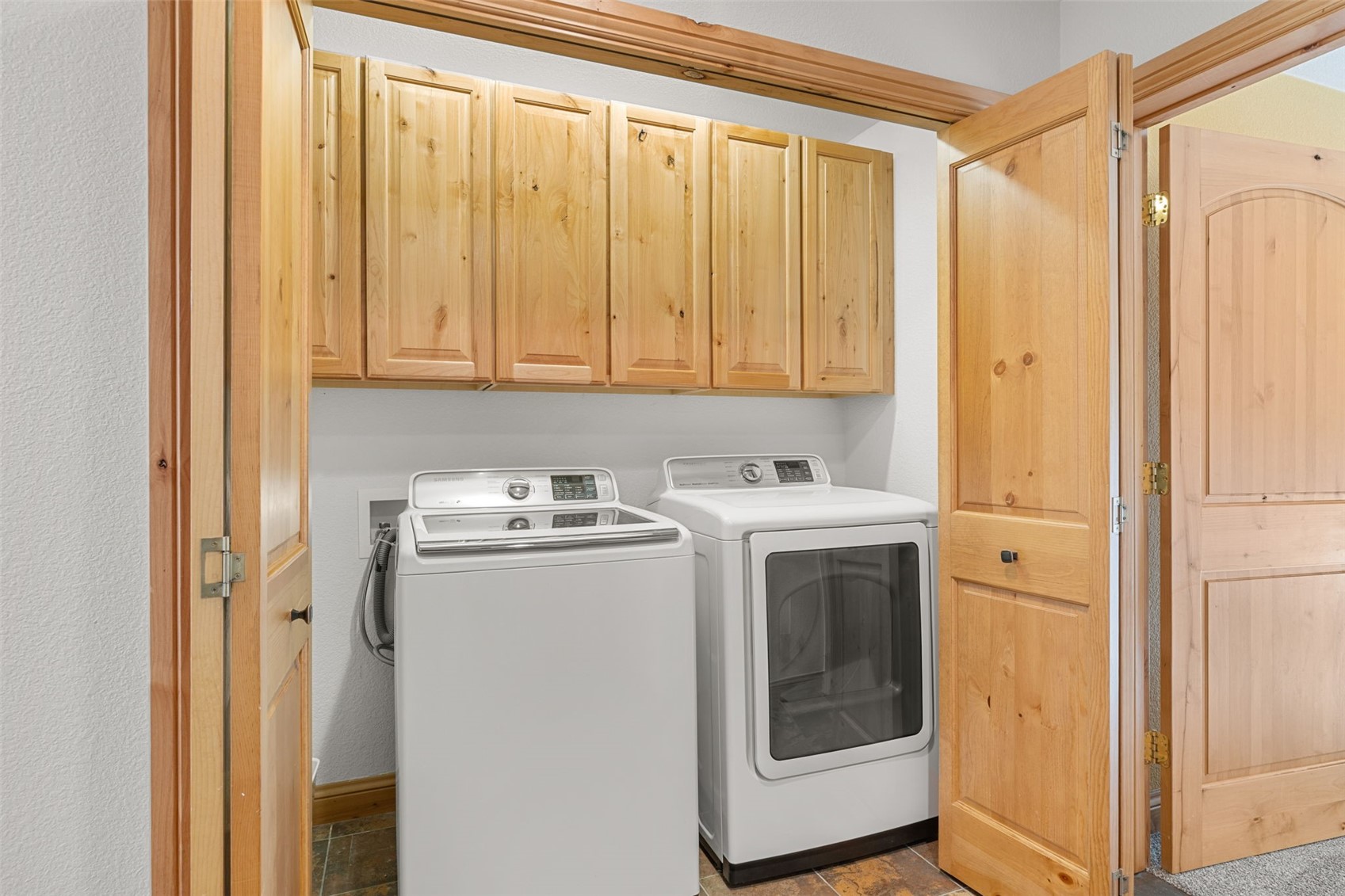 91795 Ryan Gulch Road Silverthorne, CO 80498 - Photo 32 of 50 a utility room with dryer and washer