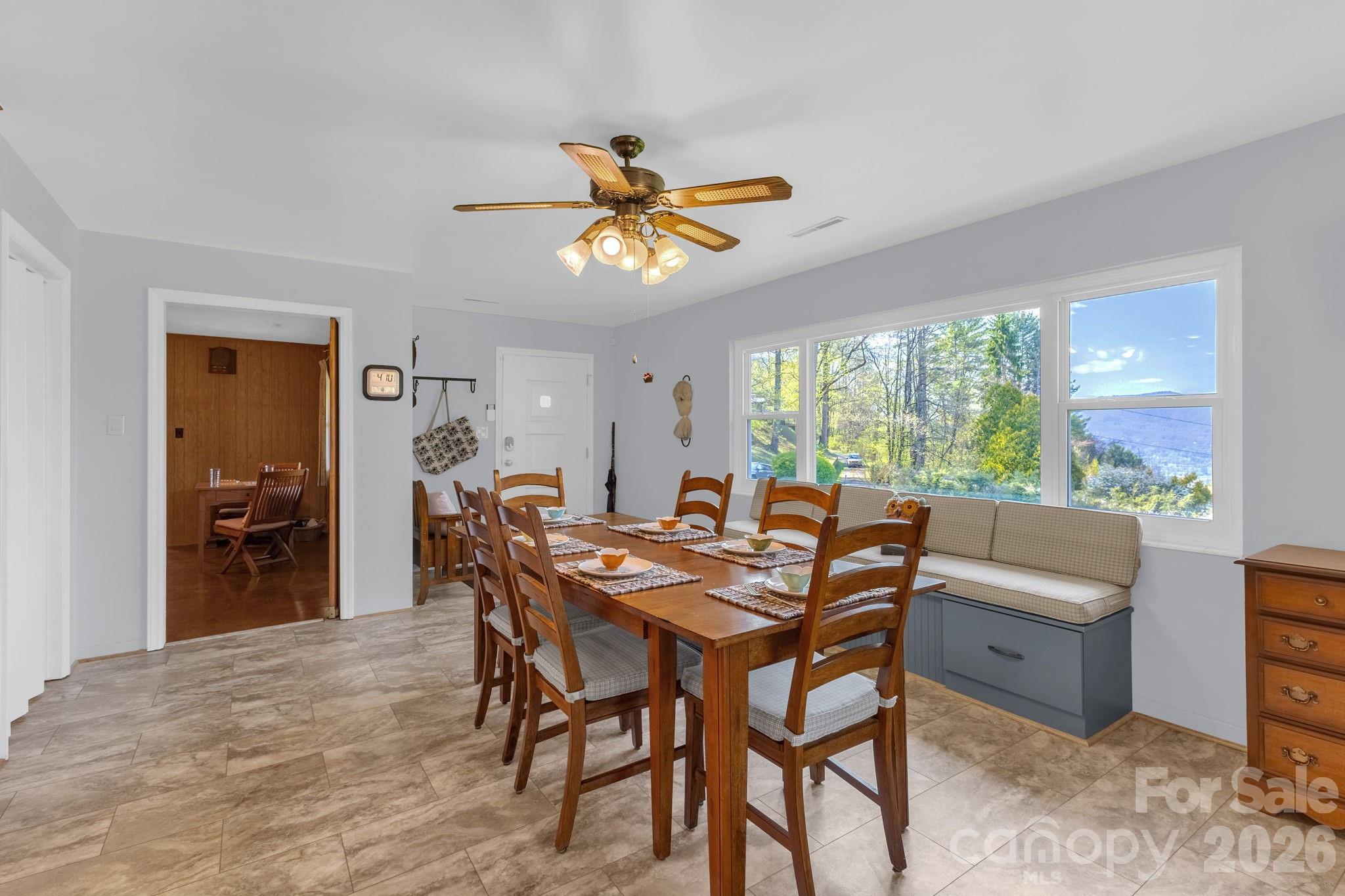 87 Rockwood Road Waynesville, NC 28786 - Photo 15 of 45 a dining room with furniture and window
