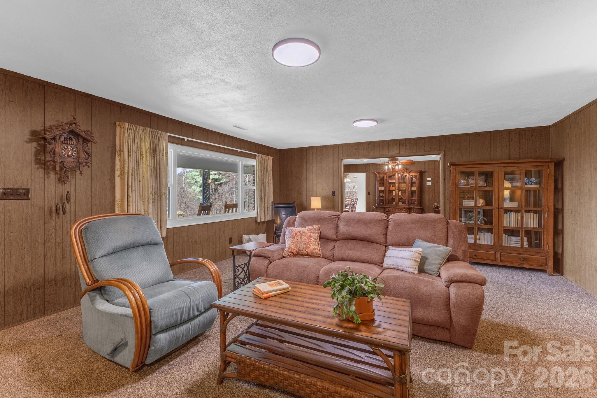 87 Rockwood Road Waynesville, NC 28786 - Photo 8 of 45 a living room with furniture and a window