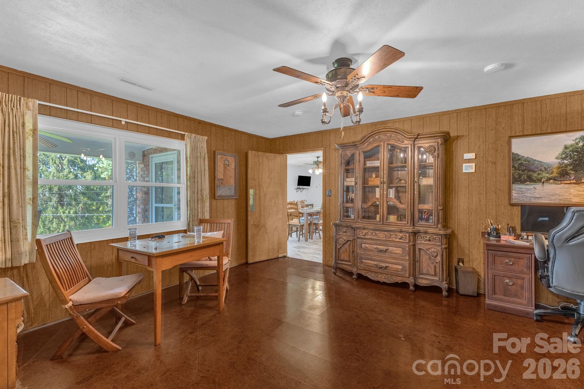 87 Rockwood Road Waynesville, NC 28786 - Photo 10 of 45 a view of a livingroom with furniture and windows