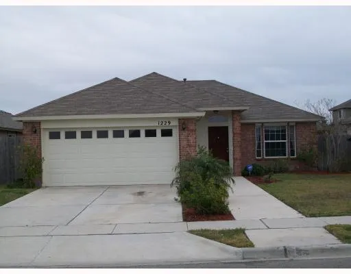 front view of house with a yard