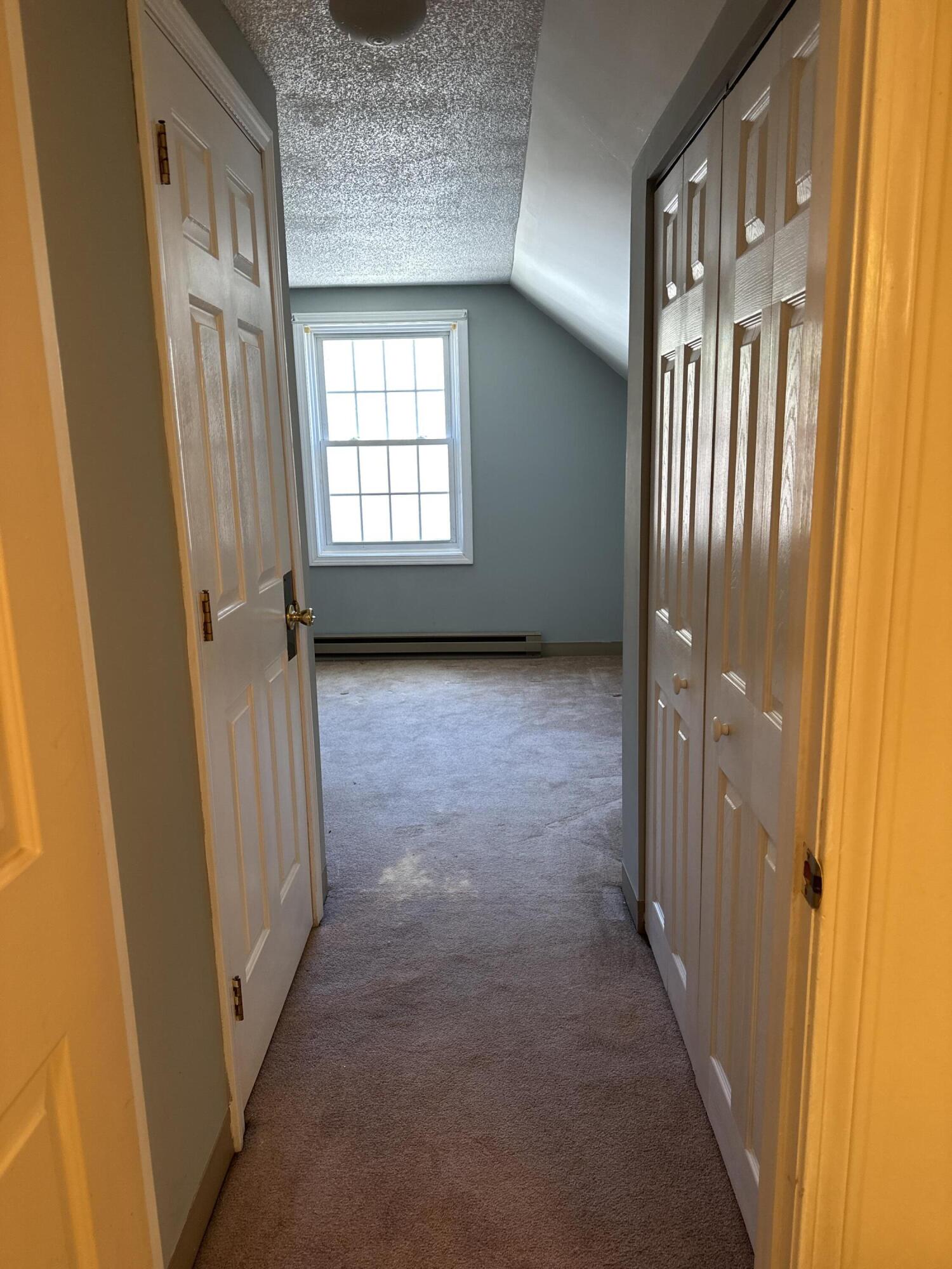 9 Cynthia Circle, Unit 9 Bangor, ME 04401 - Photo 17 of 28 2nd floor- bathroom to bedroom