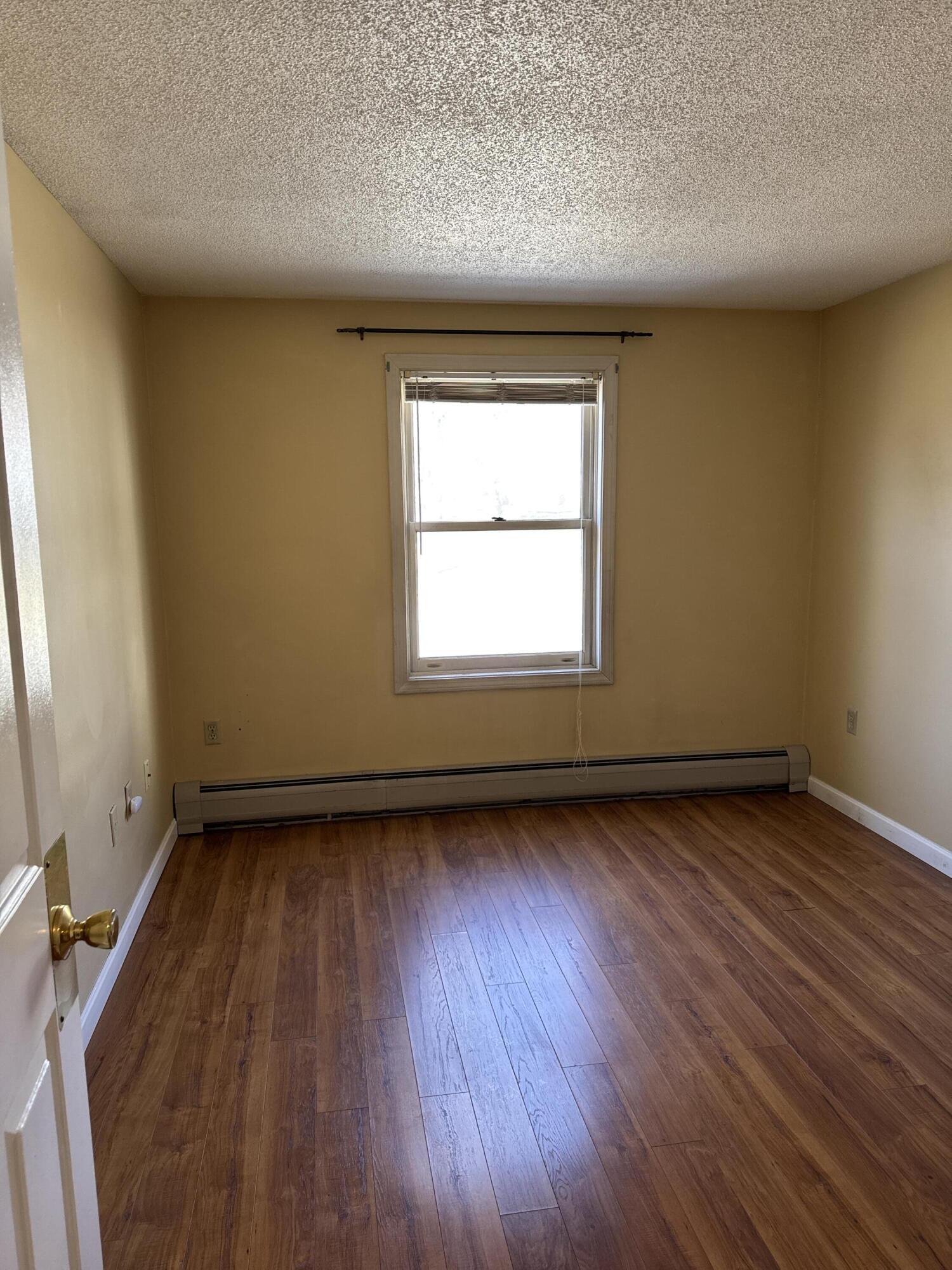 9 Cynthia Circle, Unit 9 Bangor, ME 04401 - Photo 7 of 28 !st Floor Bedroom