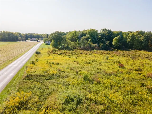 a view of a yard with an ocean