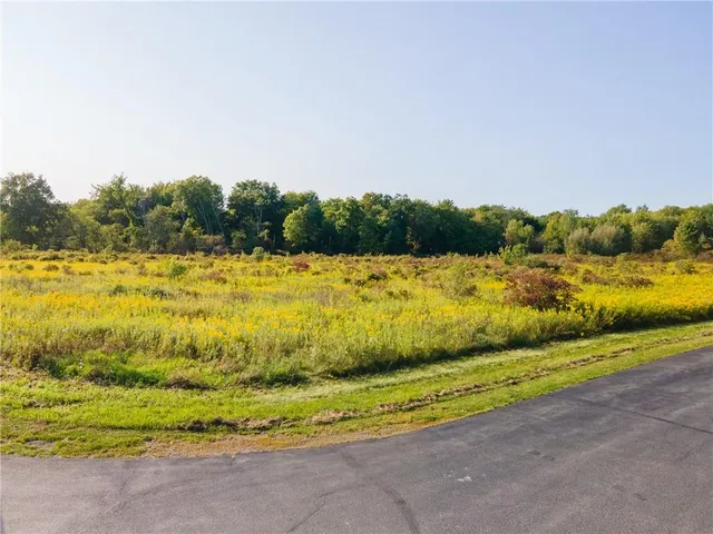 a view of swimming pool from a balcony