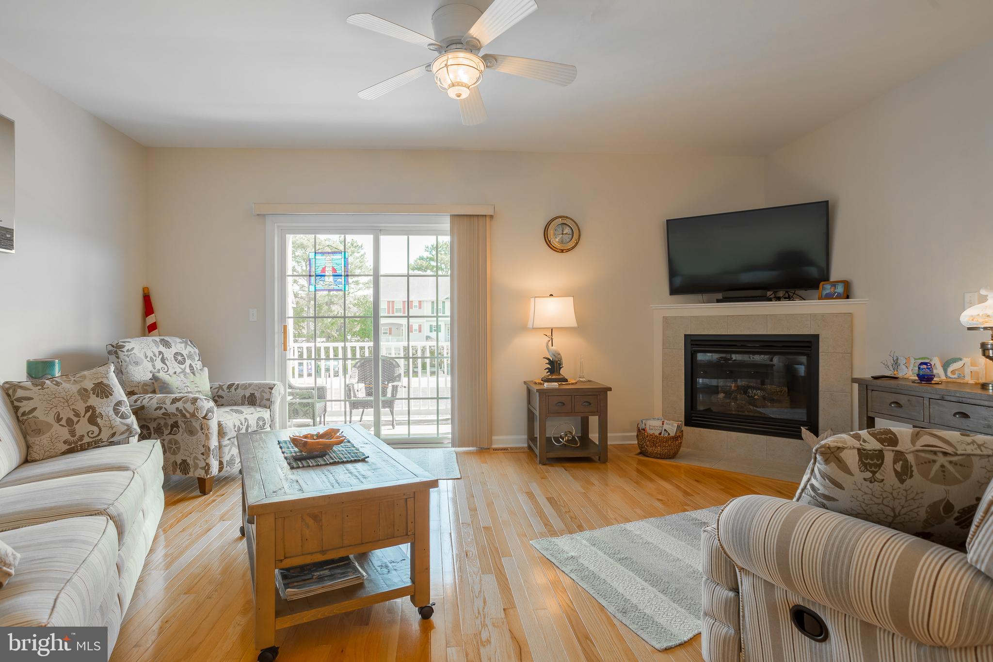 29825 Beach Air Landing Road, Unit 74 Dagsboro, DE 19939 - Photo 21 of 41 GREAT ROOM WITH FIREPLACE MAIN LEVEL