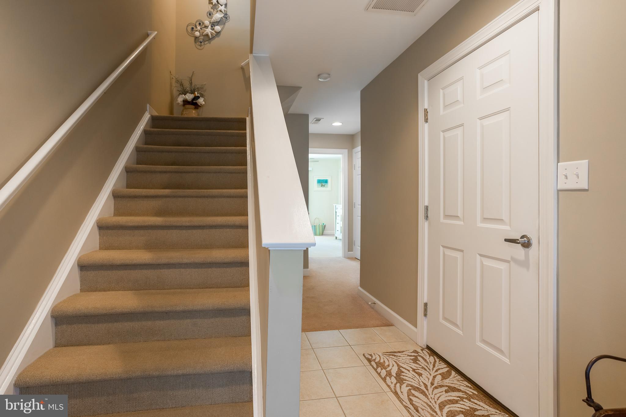 29825 Beach Air Landing Road, Unit 74 Dagsboro, DE 19939 - Photo 4 of 41 LOWER LEVEL FOYER