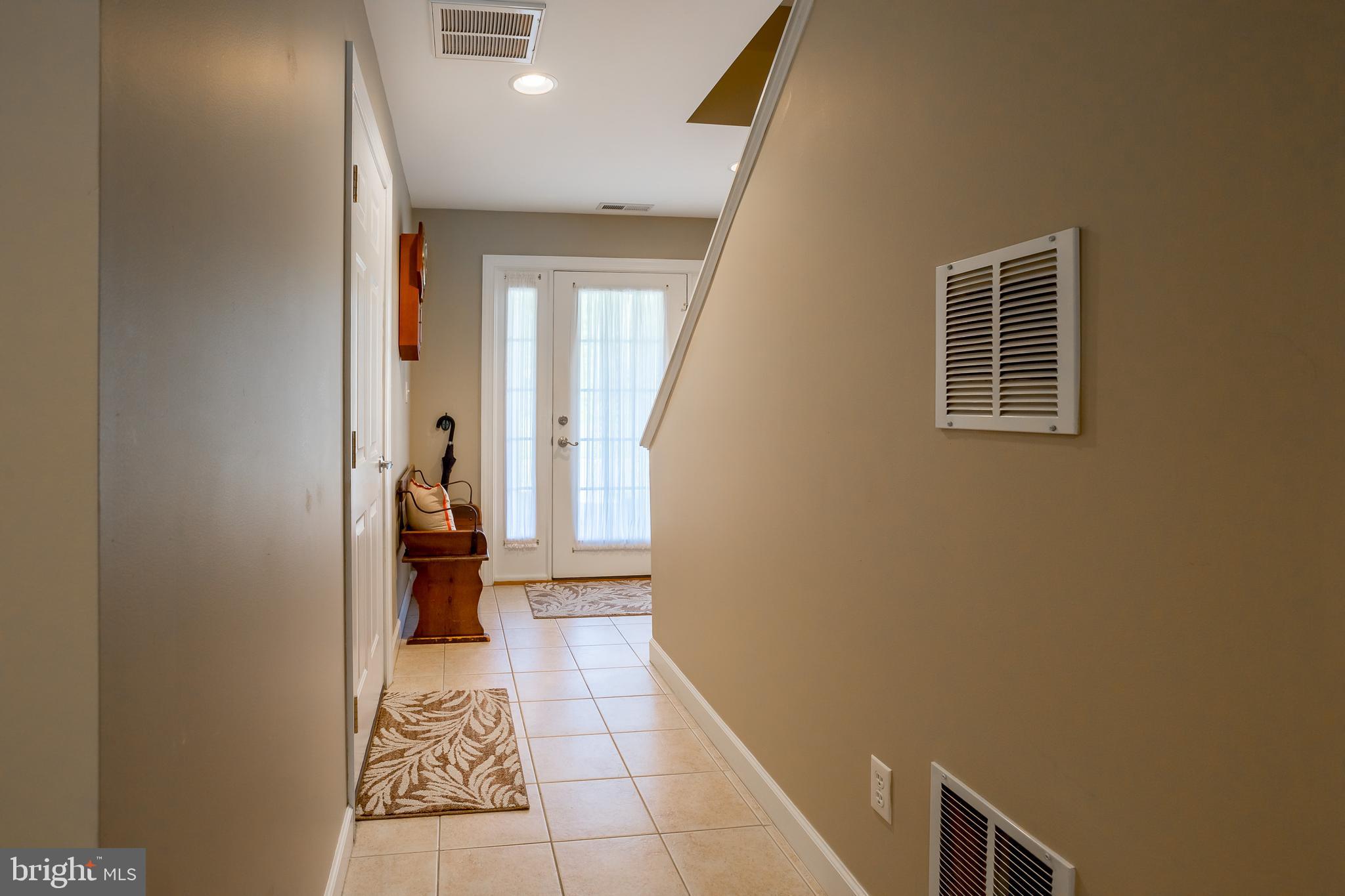 29825 Beach Air Landing Road, Unit 74 Dagsboro, DE 19939 - Photo 5 of 41 LOWER LEVEL FRONT DOOR