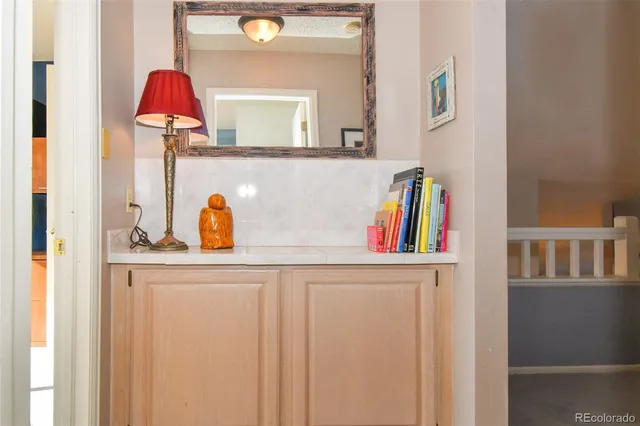 a picture of a bathroom with a sink and a mirror