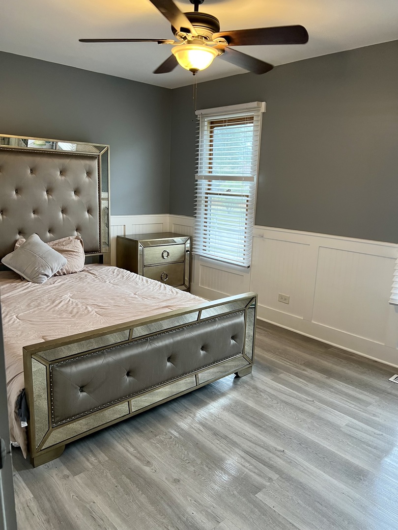 2472 Worthington Drive Aurora, IL 60506 - Photo 15 of 26 a living room with hard wood floors and a fireplace