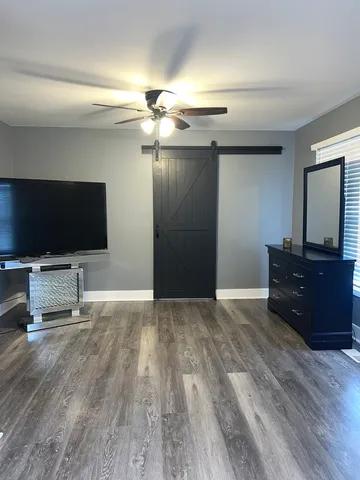 a bathroom with a double vanity sink and mirror
