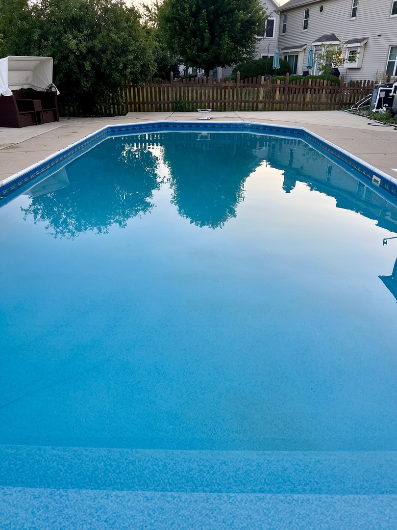 2472 Worthington Drive Aurora, IL 60506 - Photo 23 of 26 a view of a lake with a house