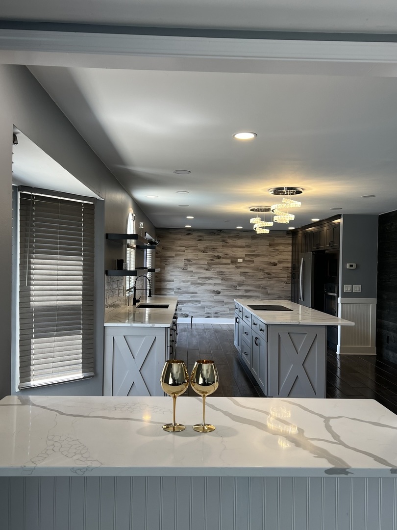 2472 Worthington Drive Aurora, IL 60506 - Photo 4 of 26 a kitchen with a sink cabinets and window