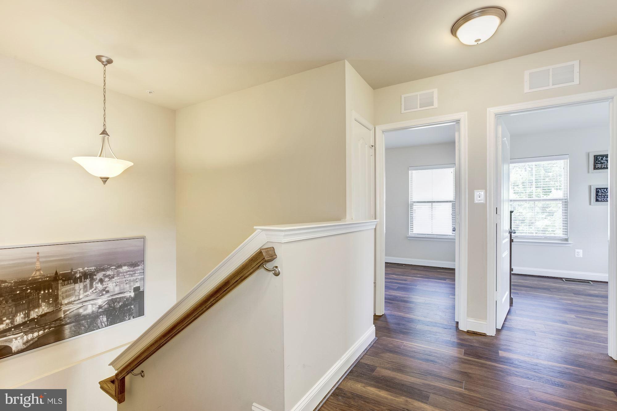 14400 Vedanta Way Silver Spring, MD 20906 - Photo 22 of 30 Third floor hallway showing two bedrooms