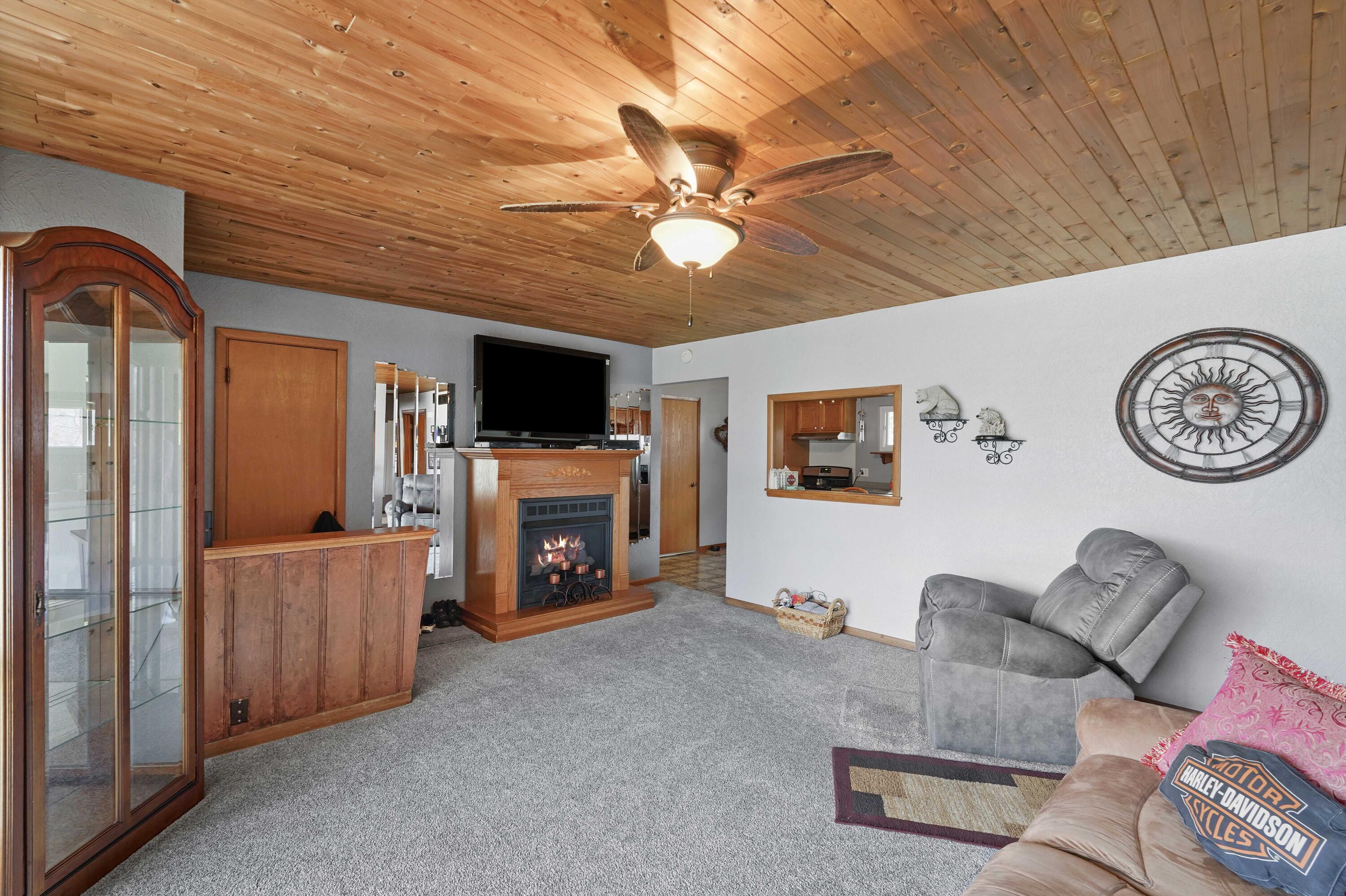 4900 Arthur Street Gary, IN 46408 - Photo 11 of 21 a living room with furniture and a flat screen tv