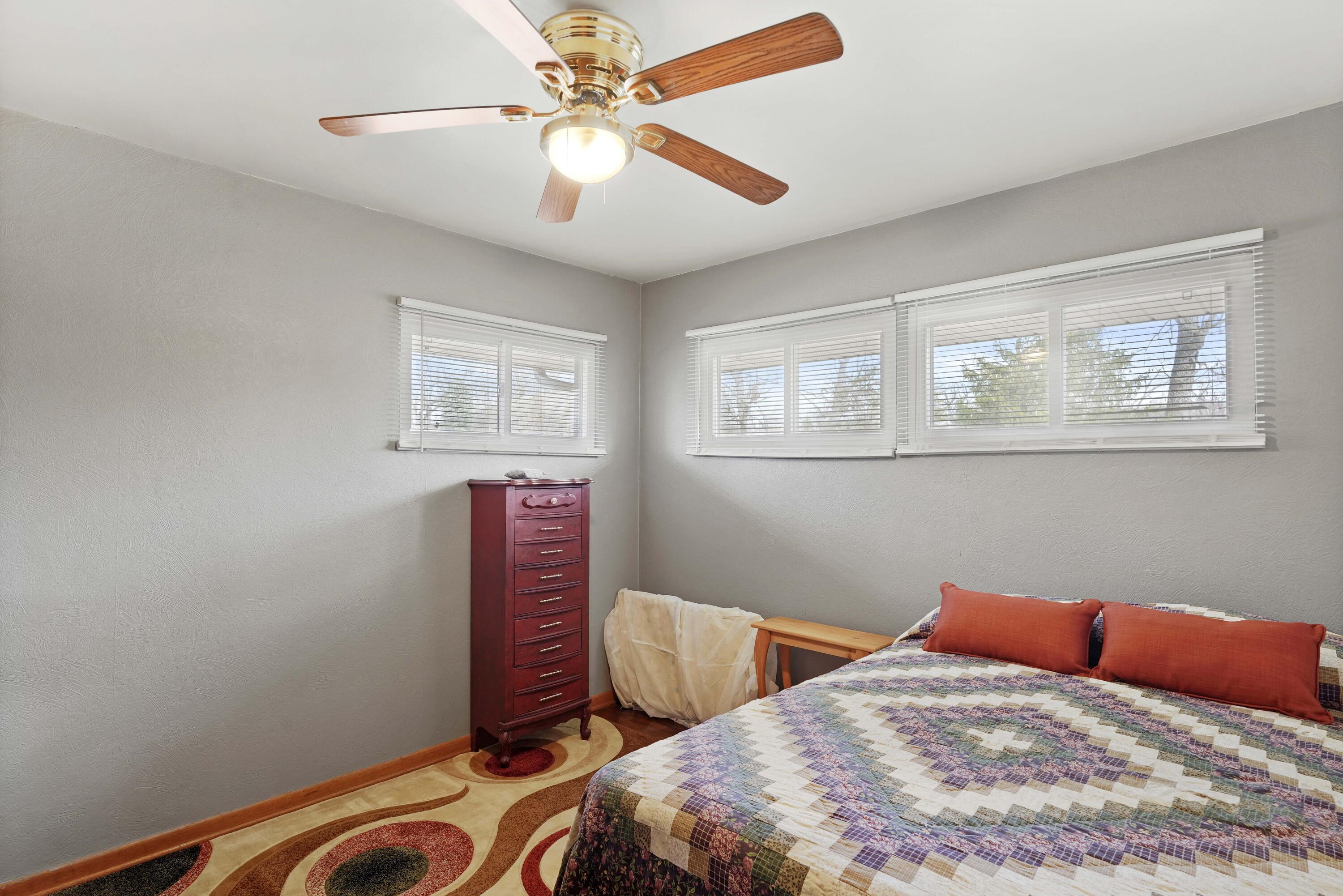 4900 Arthur Street Gary, IN 46408 - Photo 14 of 21 a bedroom with bed and a window