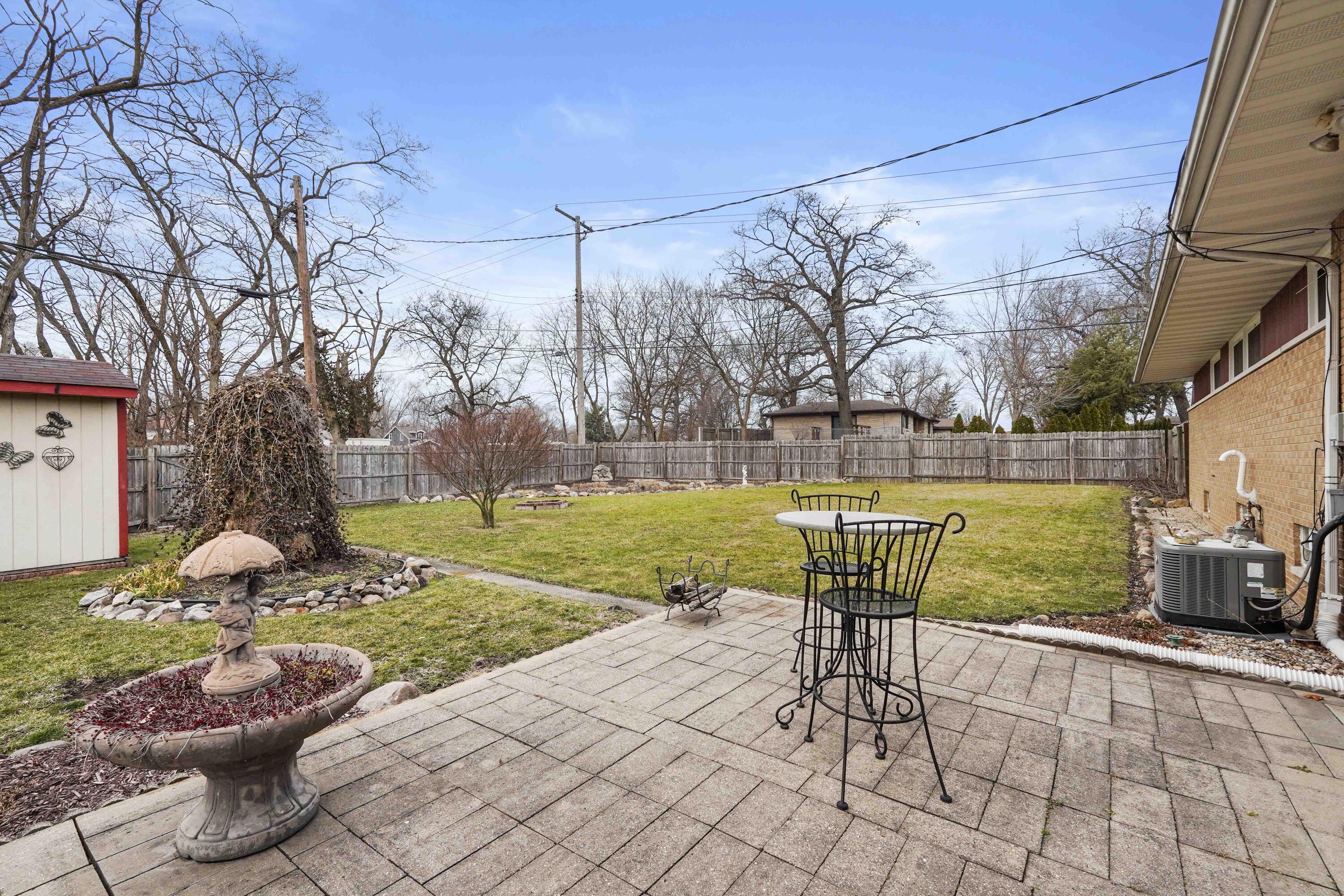 4900 Arthur Street Gary, IN 46408 - Photo 18 of 21 a view of a porch with furniture and garden