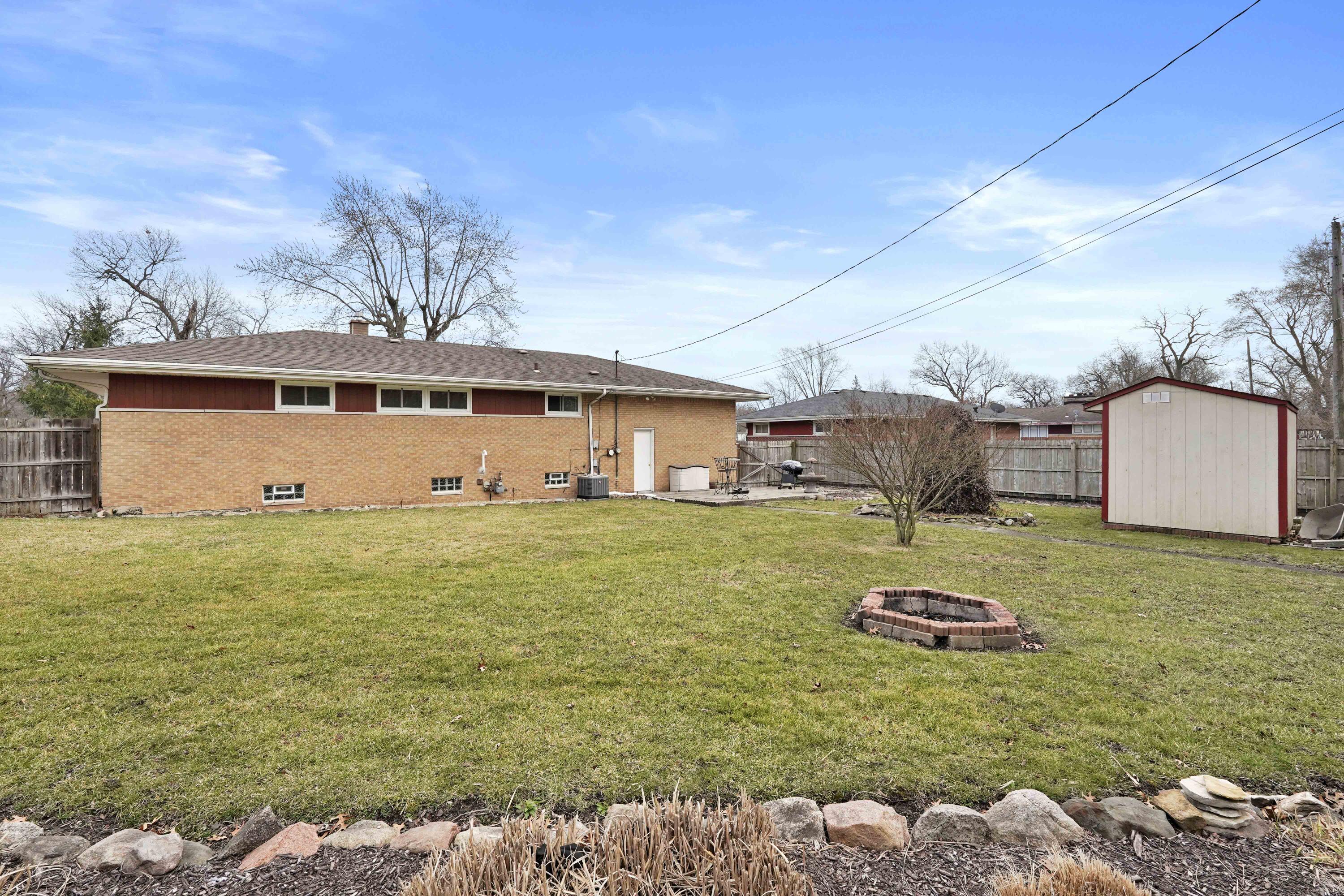 4900 Arthur Street Gary, IN 46408 - Photo 19 of 21 a front view of a house with a yard