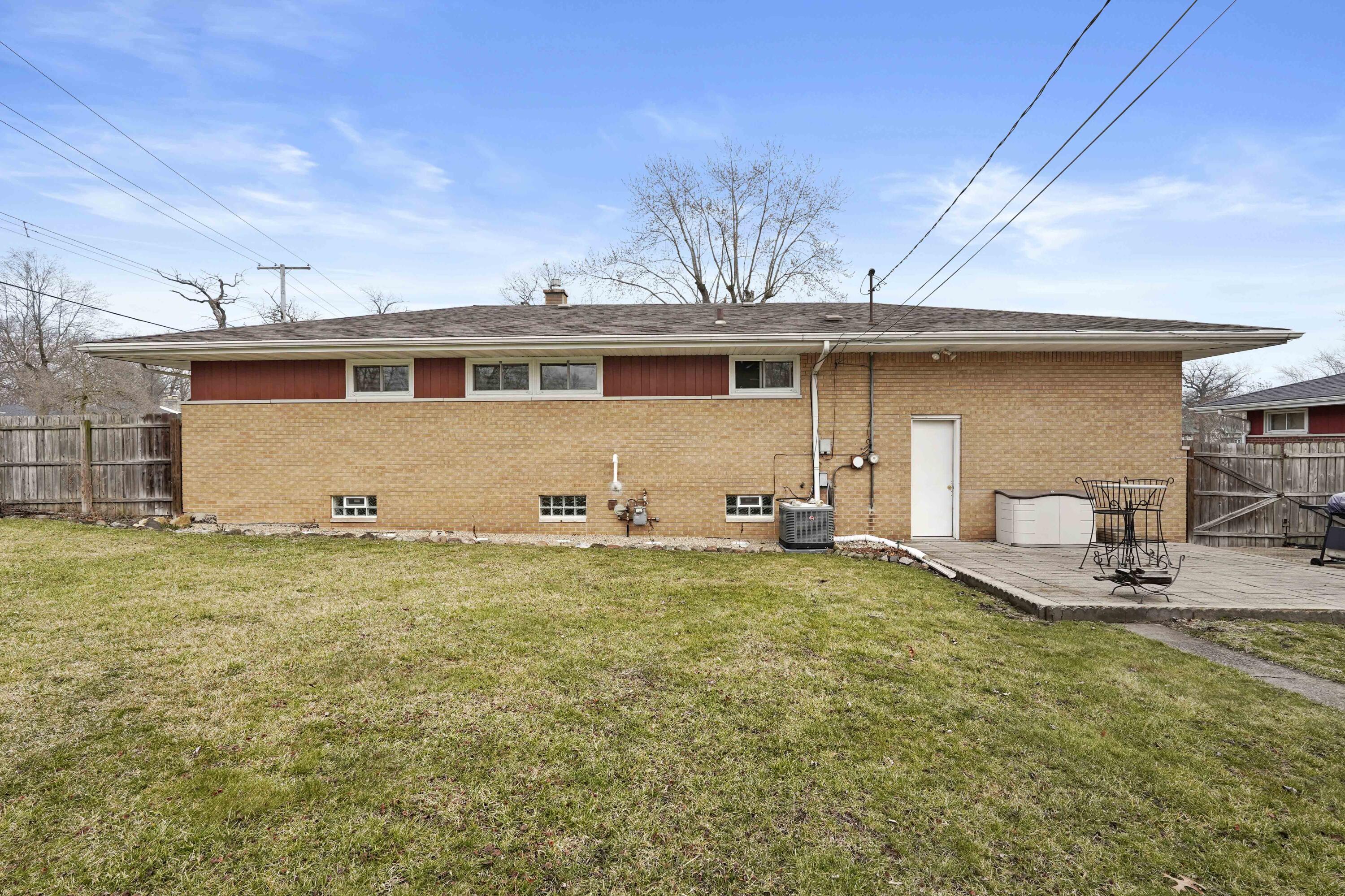 4900 Arthur Street Gary, IN 46408 - Photo 20 of 21 a view of a house with backyard and sitting area