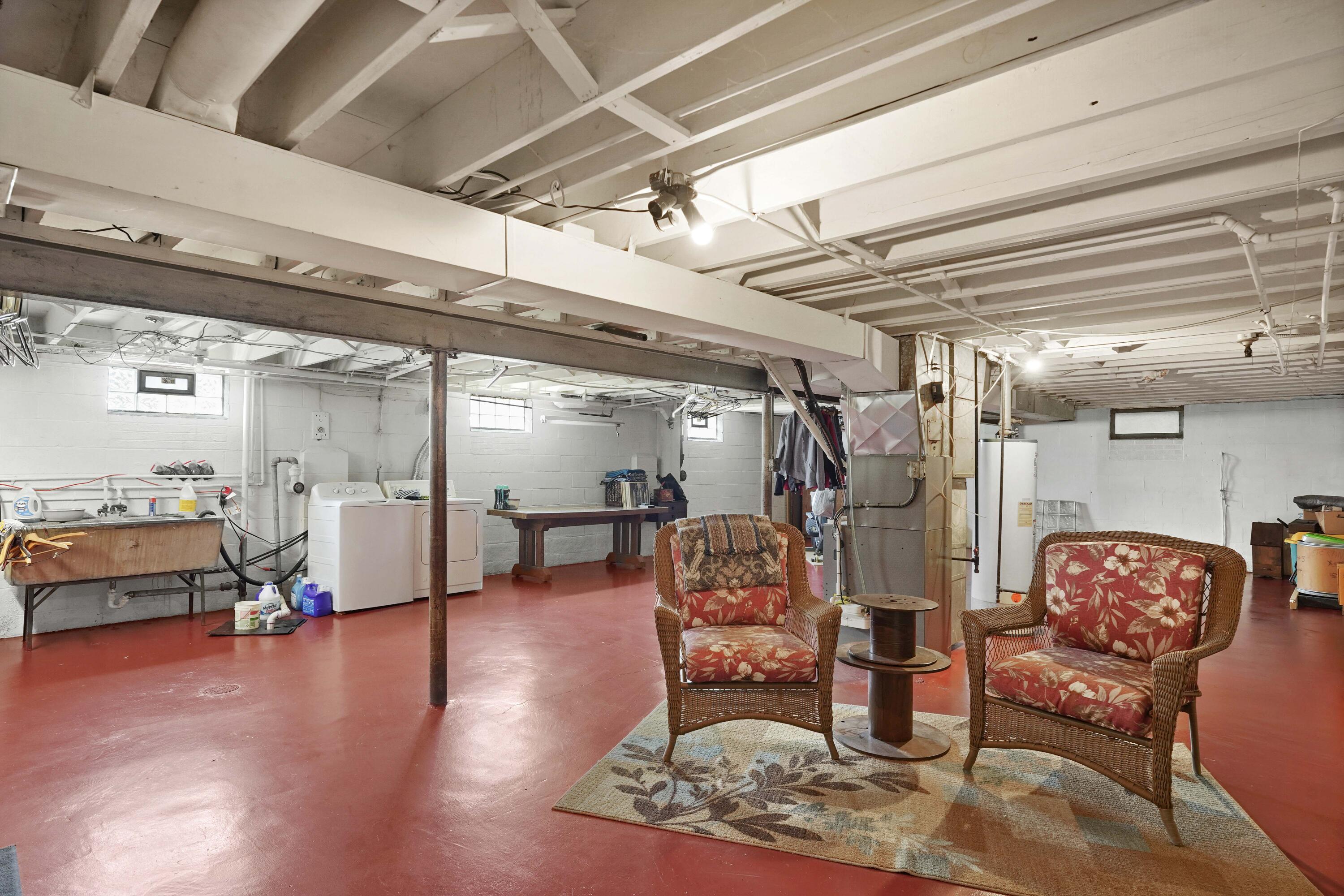 4900 Arthur Street Gary, IN 46408 - Photo 6 of 21 a living room with lots of furniture and a chandelier