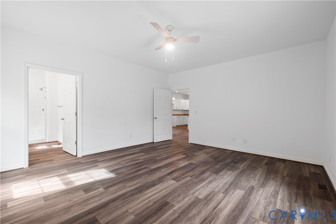 178 Barter Hill Road Cumberland, VA 23040 - Photo 17 of 34 Primary bedroom view with LVP flooring and ceiling