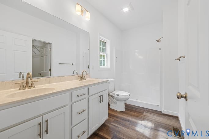 178 Barter Hill Road Cumberland, VA 23040 - Photo 18 of 34 Ensuite with double vanity, a stall shower, and LV