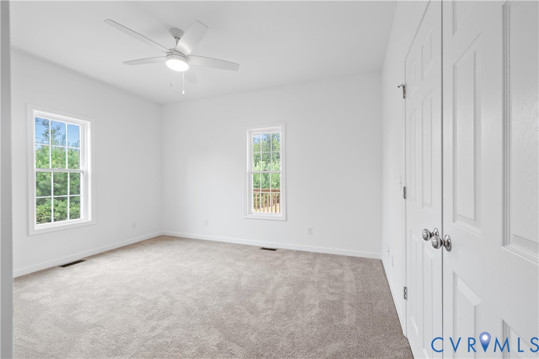 178 Barter Hill Road Cumberland, VA 23040 - Photo 21 of 34 Bedroom featuring light colored carpet and a ceili