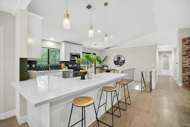 a view of a dining room with furniture