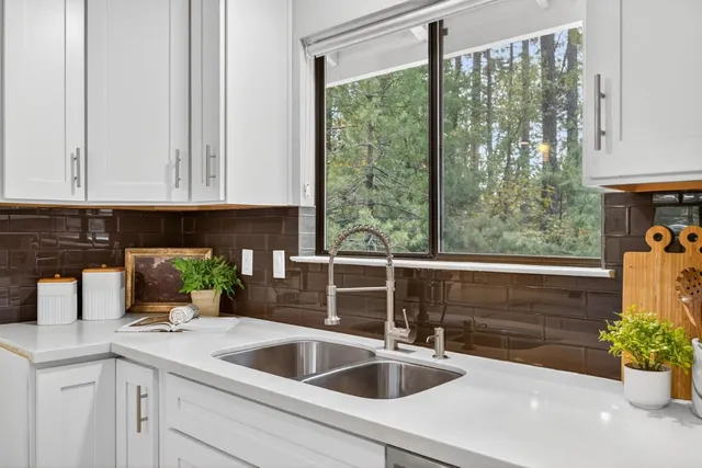 a view of entryway with furniture and wooden floor