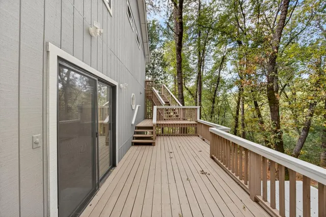 a house with trees in the background