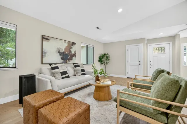 a kitchen with stainless steel appliances sink and cabinets