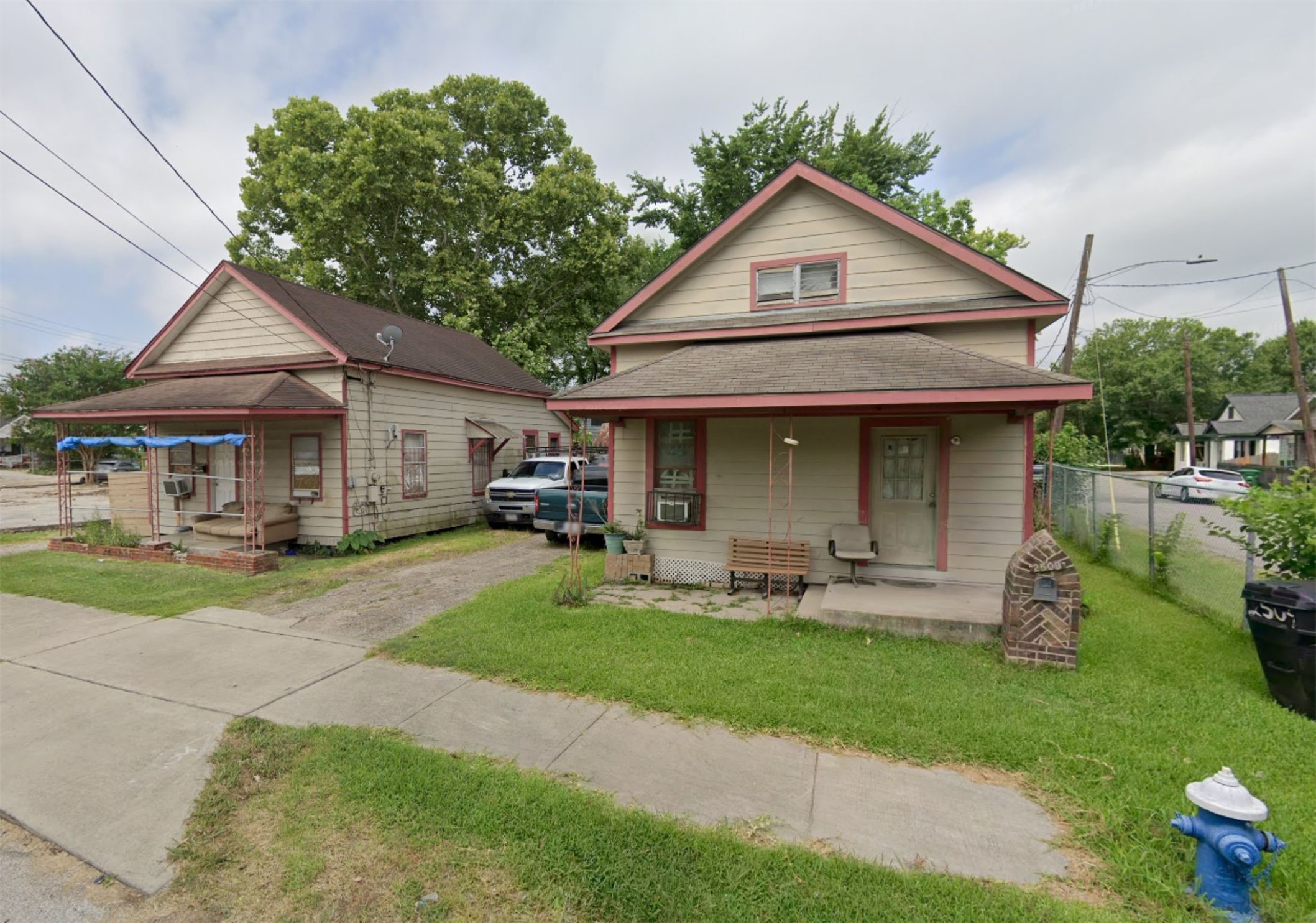2507 Gentry Street Houston, TX 77009 - Photo 1 of 6 a front view of a house with a yard and porch