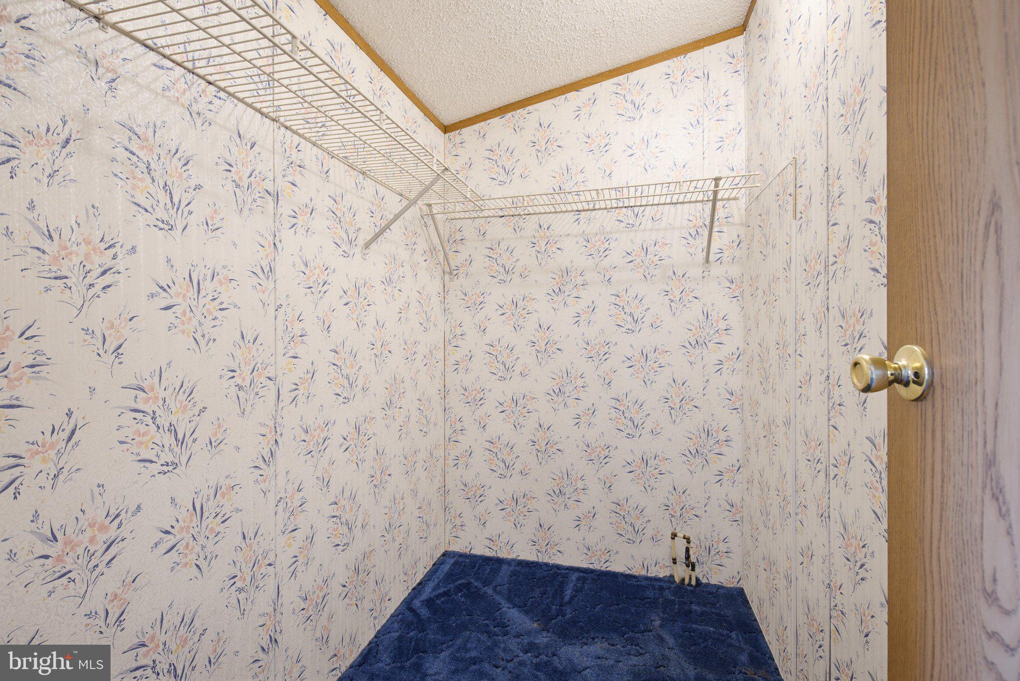 475 Wabash Road Ephrata, PA 17522 - Photo 23 of 33 Charming closet with floral wallpaper.