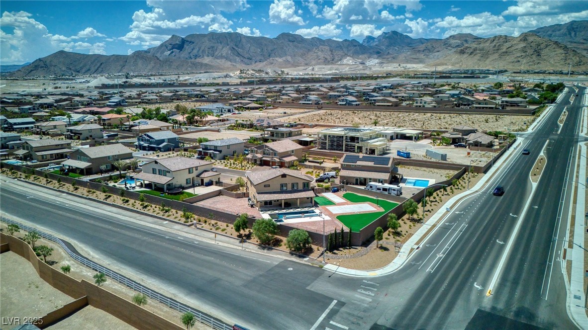 5592 Hickory Tree Street Las Vegas, NV 89149 - Photo 20 of 87 Aerial view of residential area with a mountainous background