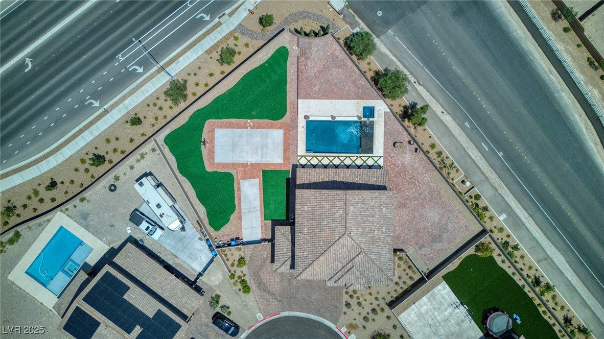 5592 Hickory Tree Street Las Vegas, NV 89149 - Photo 23 of 87 View of subject property featuring a pool