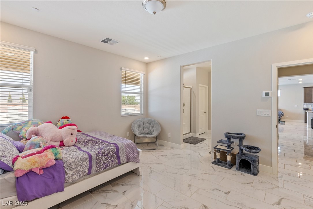 5592 Hickory Tree Street Las Vegas, NV 89149 - Photo 38 of 87 Bedroom featuring marble finish floors, ensuite bathroom, and recessed lighting