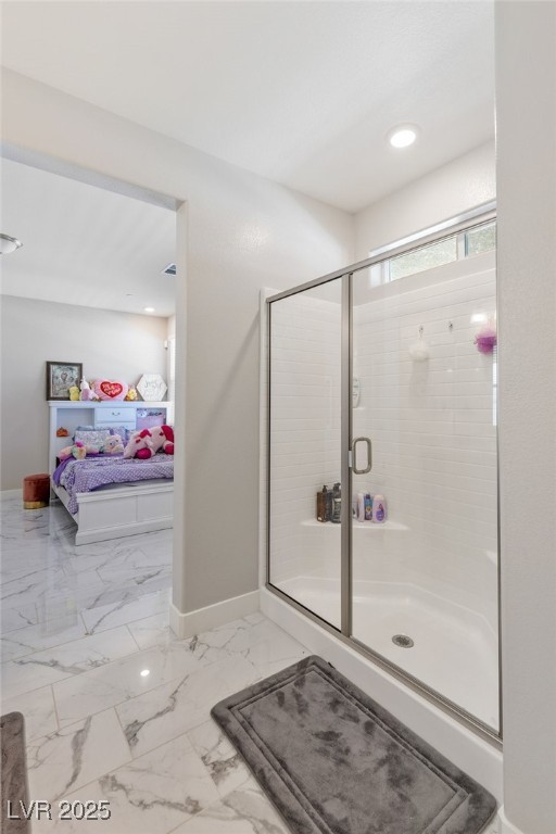 5592 Hickory Tree Street Las Vegas, NV 89149 - Photo 40 of 87 Ensuite bathroom featuring light marble finish floors, a shower stall, and recessed lighting