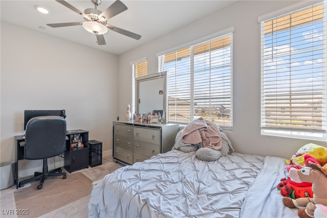 5592 Hickory Tree Street Las Vegas, NV 89149 - Photo 49 of 87 Bedroom featuring light carpet, a ceiling fan, an office area, and recessed lighting