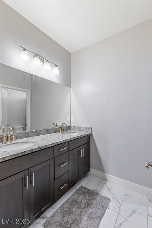 5592 Hickory Tree Street Las Vegas, NV 89149 - Photo 50 of 87 Full bath with double vanity and light marble finish floors