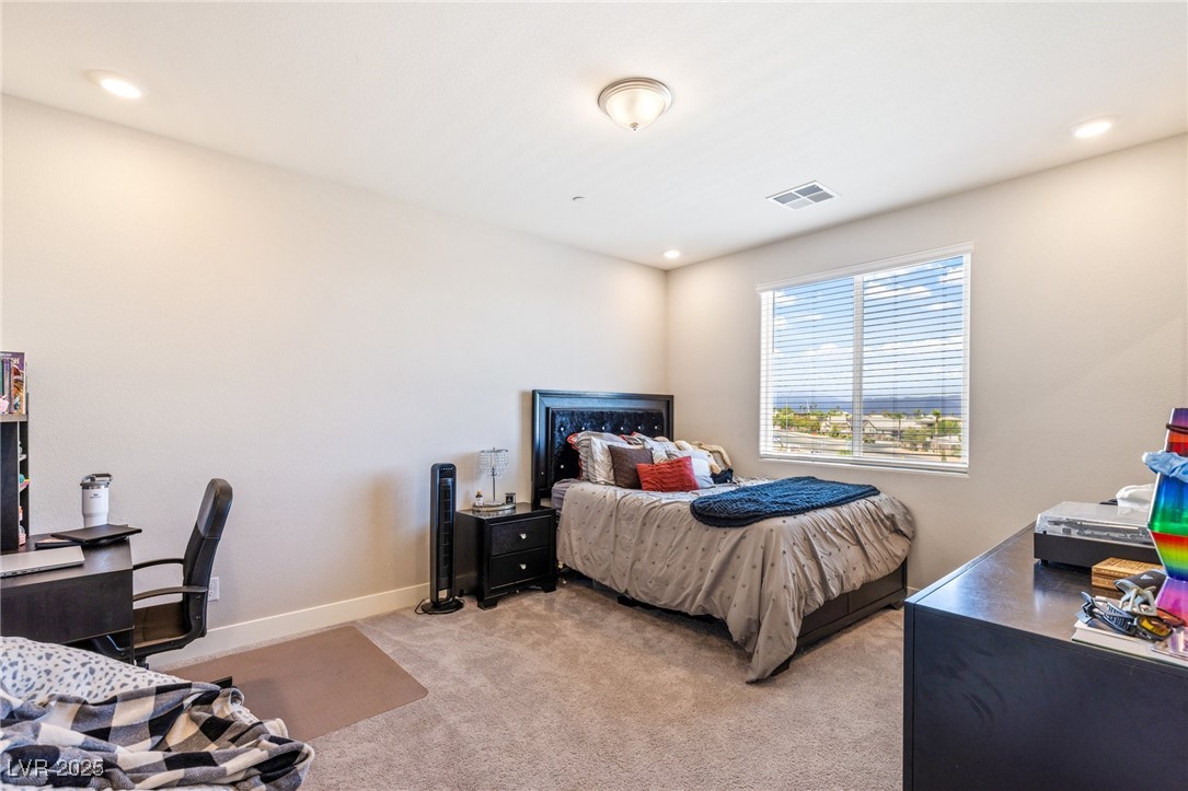 5592 Hickory Tree Street Las Vegas, NV 89149 - Photo 51 of 87 Bedroom with an office area, light carpet, and recessed lighting