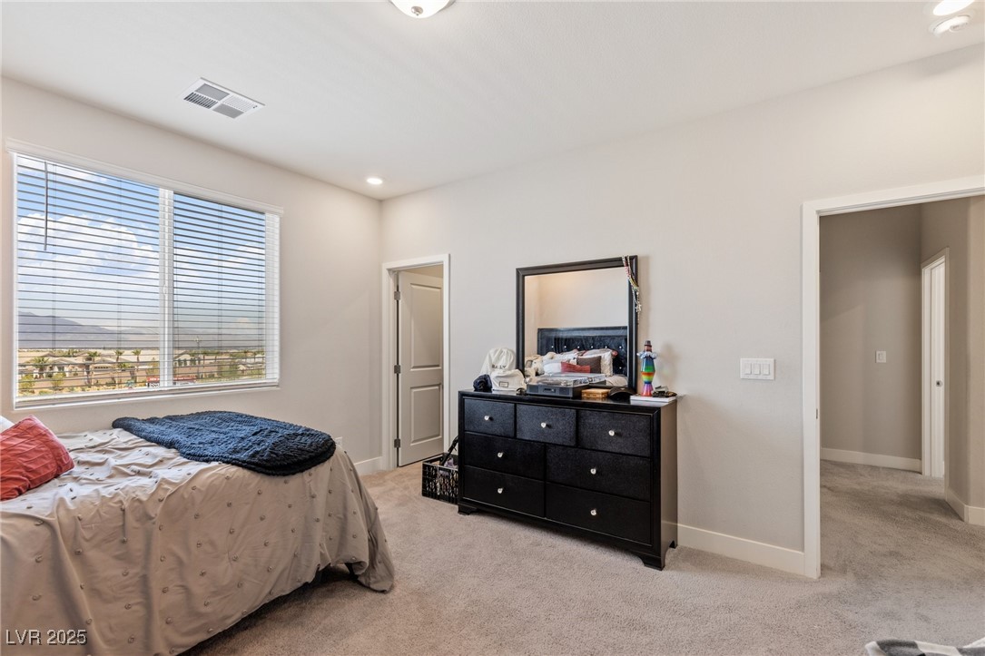 5592 Hickory Tree Street Las Vegas, NV 89149 - Photo 52 of 87 Bedroom featuring light carpet and recessed lighting