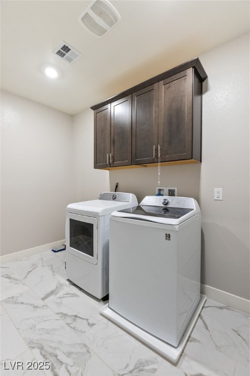 5592 Hickory Tree Street Las Vegas, NV 89149 - Photo 55 of 87 Laundry area with light marble finish floors, cabinet space, washing machine and dryer, and recessed lighting