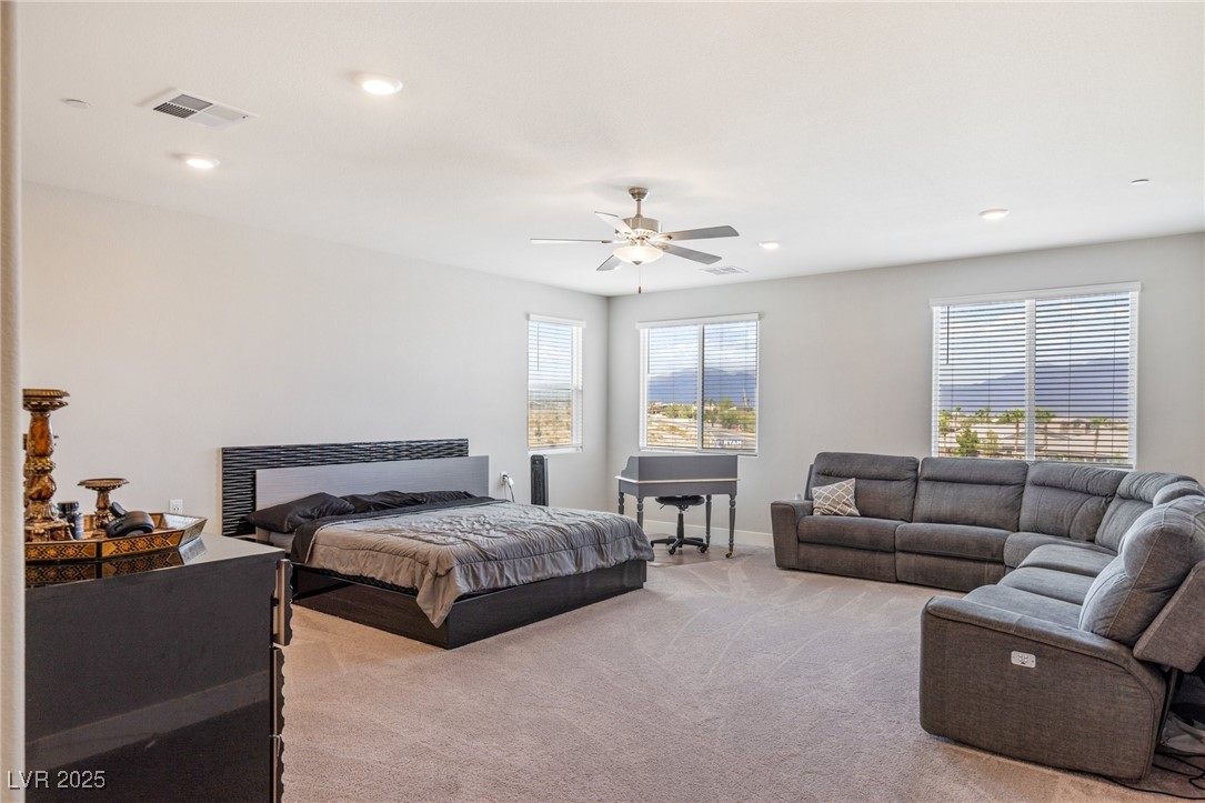 5592 Hickory Tree Street Las Vegas, NV 89149 - Photo 58 of 87 Bedroom featuring light carpet, ceiling fan, and recessed lighting