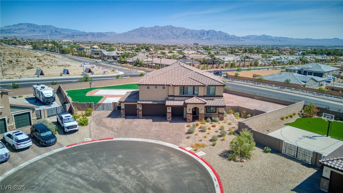 5592 Hickory Tree Street Las Vegas, NV 89149 - Photo 7 of 87 Aerial perspective of suburban area with mountains