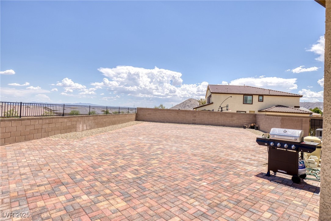5592 Hickory Tree Street Las Vegas, NV 89149 - Photo 71 of 87 Fenced backyard featuring a grill