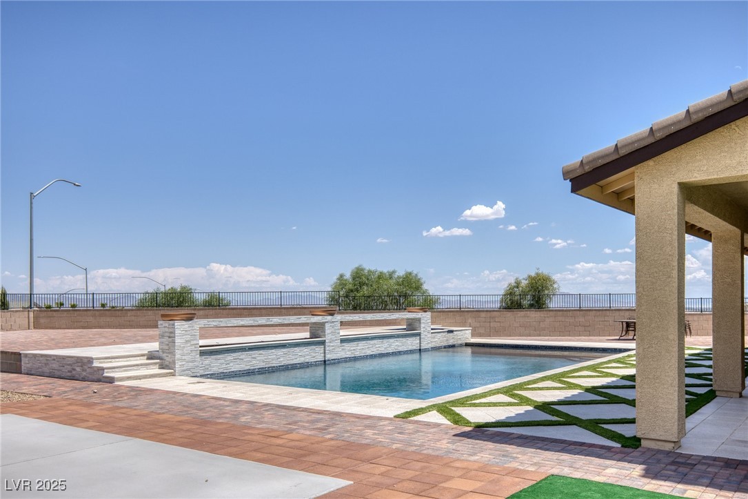5592 Hickory Tree Street Las Vegas, NV 89149 - Photo 75 of 87 View of pool featuring a patio and a fenced backyard