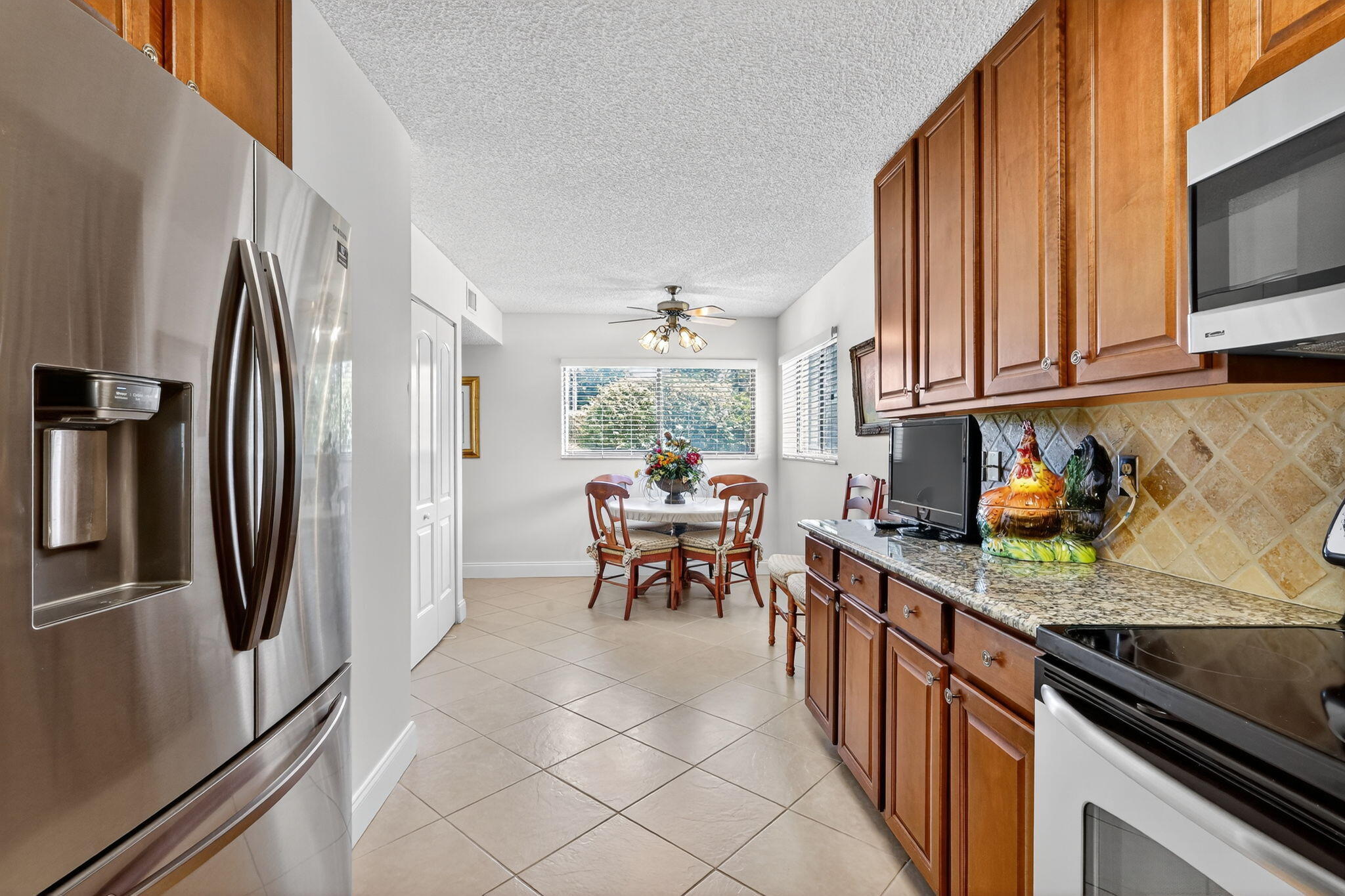 5550 Witney Drive, Unit 101 Delray Beach, FL 33484 - Photo 17 of 32 16-web-or-mls-_82A6944